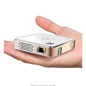 New without tags.  Kodak portable projector. Has not been used. . MSRP $179